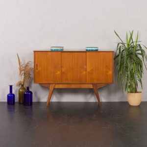 il_1000x1000.5173923816_553d.jpg Danish highboard in teak with solid teak base and hidden drawer, Randers, Denmark 1960s.