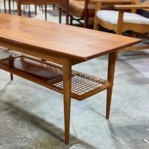 il_1000x1000.6692546148_o602.jpg Danish Mid Century Modern Coffee Table with Rattan Magazine Rack