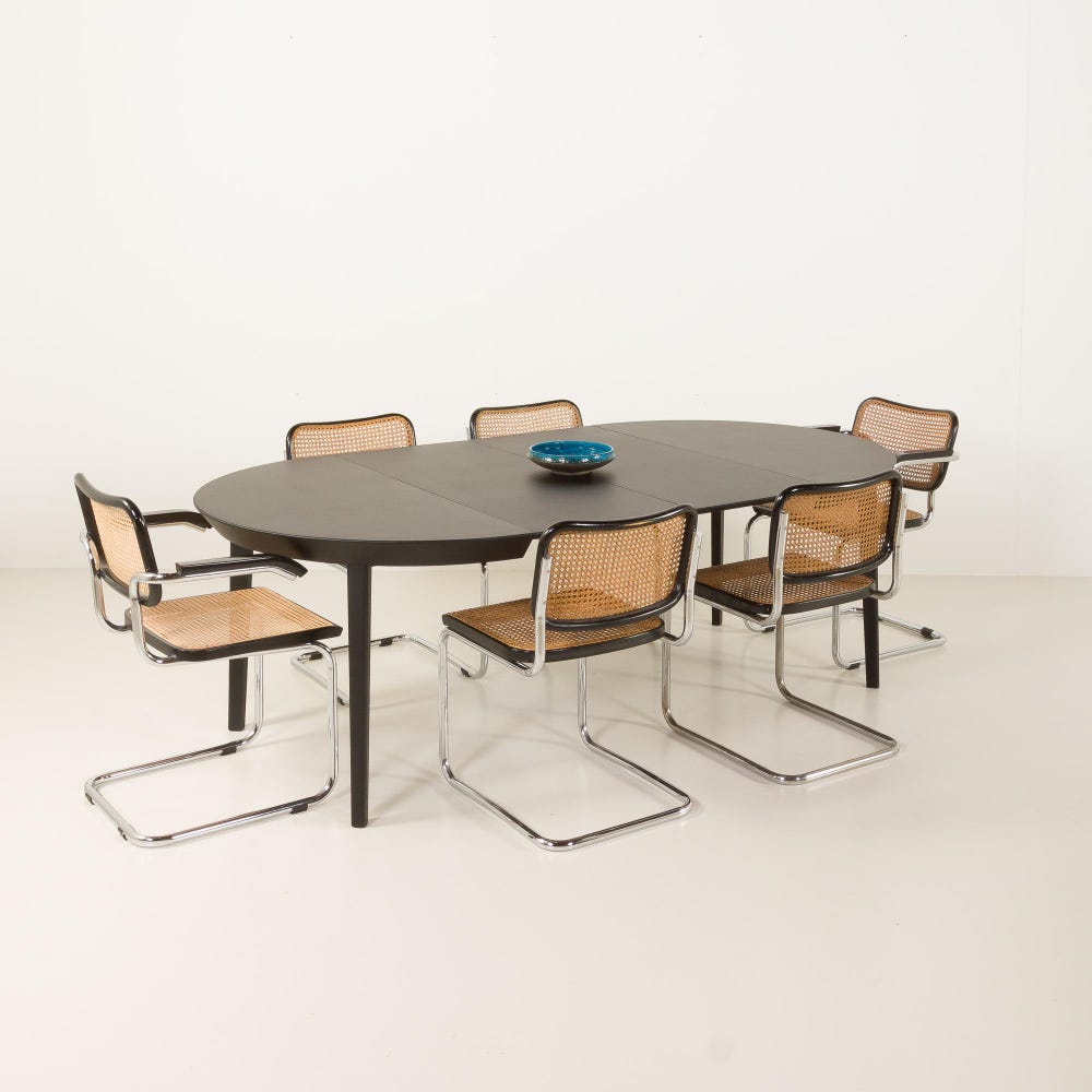 Ole Hald, circular extension teak dining table in black varnish for Gudme Mobelfabrik, Denmark, 1960s